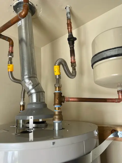 Water heater installation and plumbing repair in Mercer Square